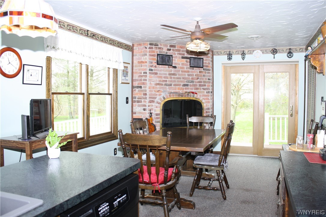 2831 Lower Mountain Road Lewiston, NY 14131 - Photo 8 of 44 Kitchen with woodburning fireplace