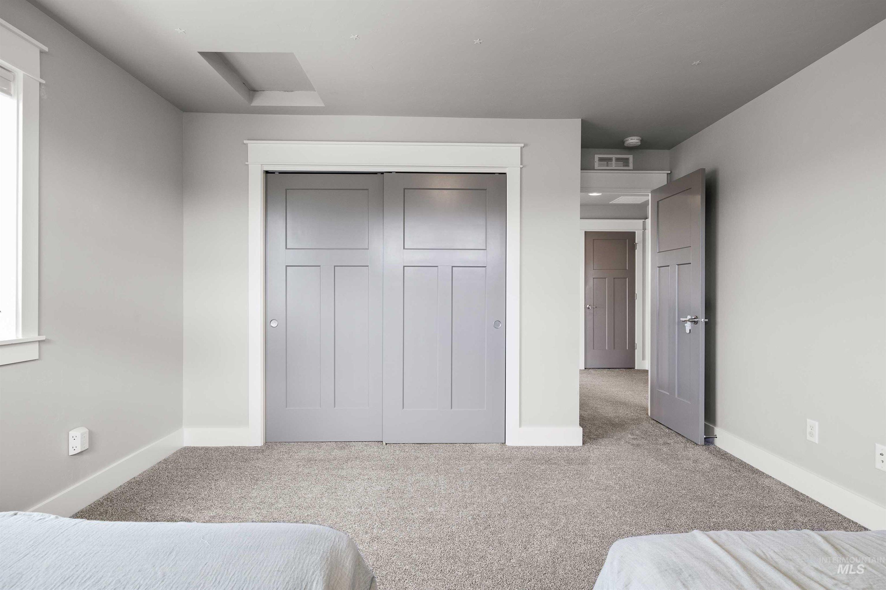 2441 Blick Lane Twin Falls, ID 83301 - Photo 22 of 50 Bedroom featuring carpet floors and a closet