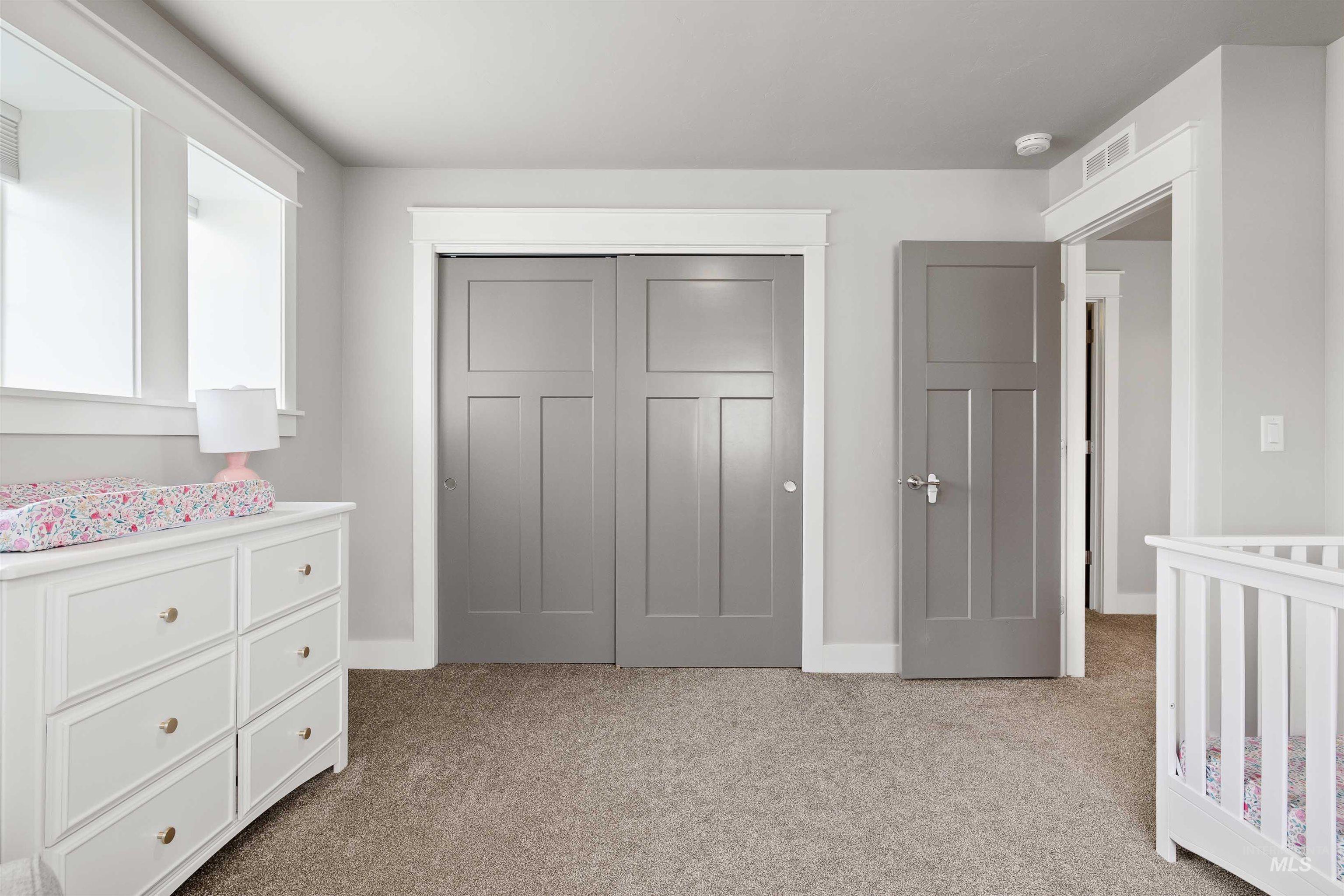 2441 Blick Lane Twin Falls, ID 83301 - Photo 24 of 50 Bedroom with light colored carpet and a closet