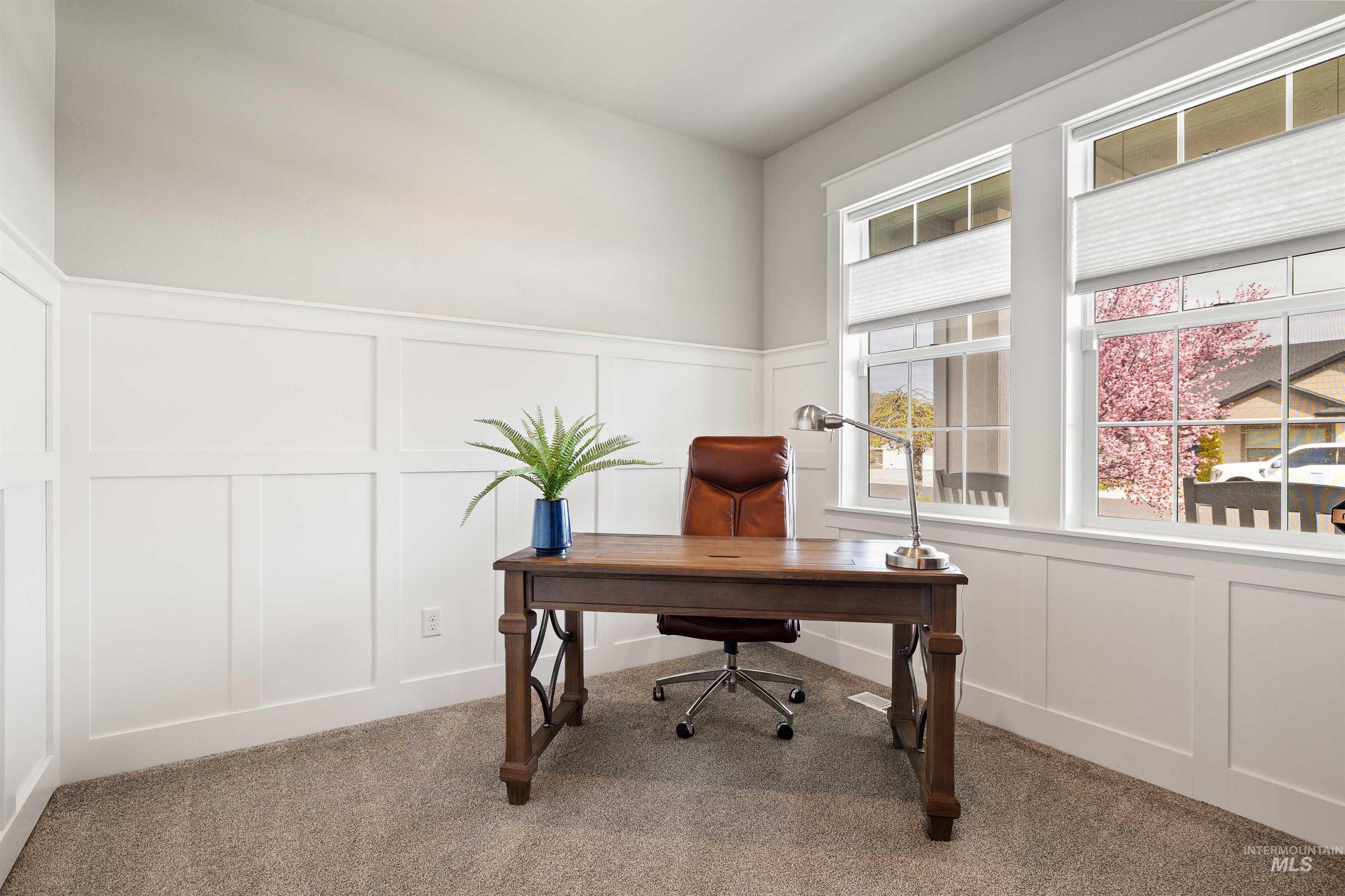 2441 Blick Lane Twin Falls, ID 83301 - Photo 31 of 50 Office area featuring a decorative wall, wainscoting, and carpet