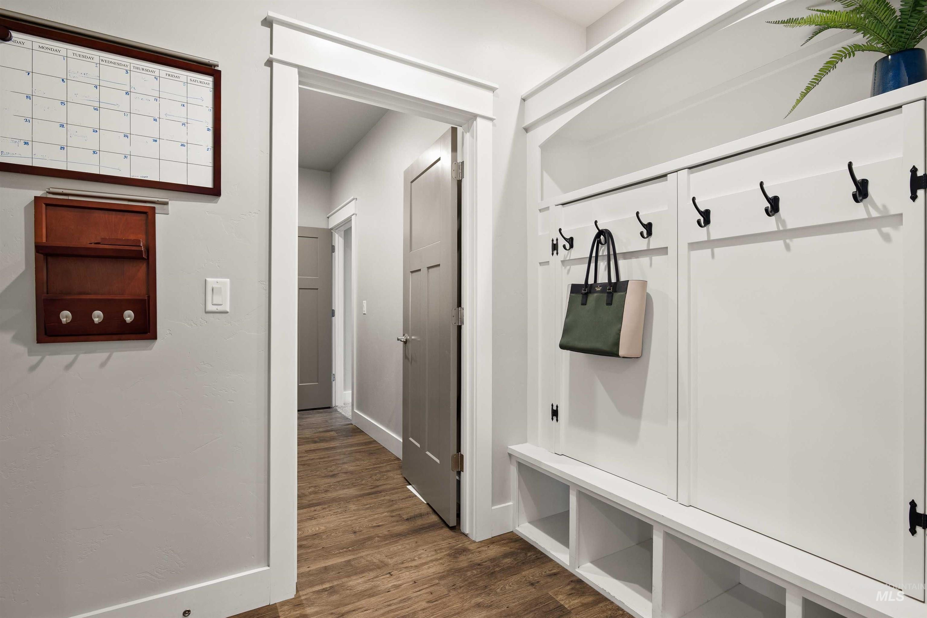 2441 Blick Lane Twin Falls, ID 83301 - Photo 36 of 50 Mudroom featuring dark wood-type flooring and baseboards