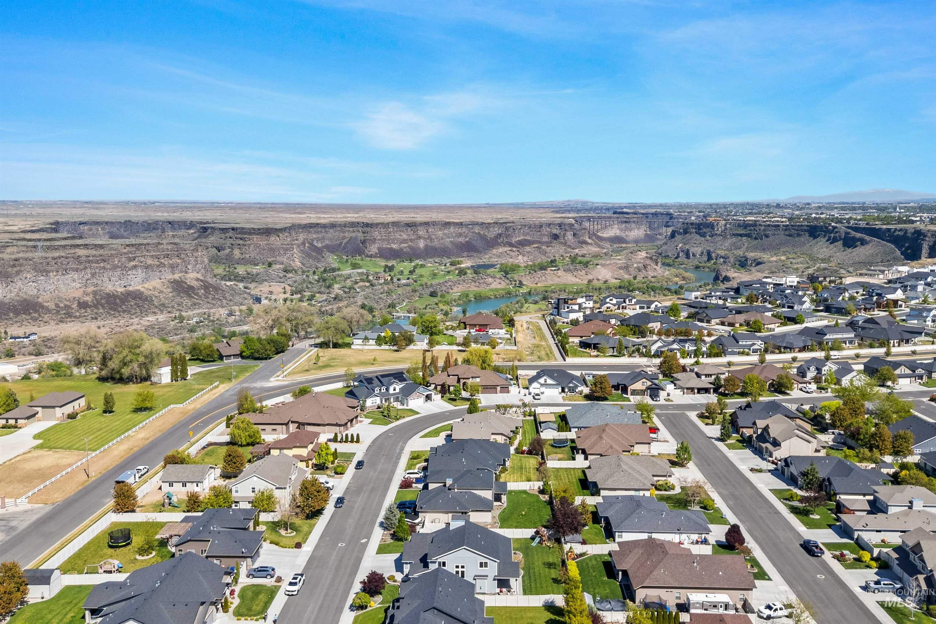 2441 Blick Lane Twin Falls, ID 83301 - Photo 48 of 50 Aerial perspective showcasing a residential neighborhood with varied home styles and lush green lawns