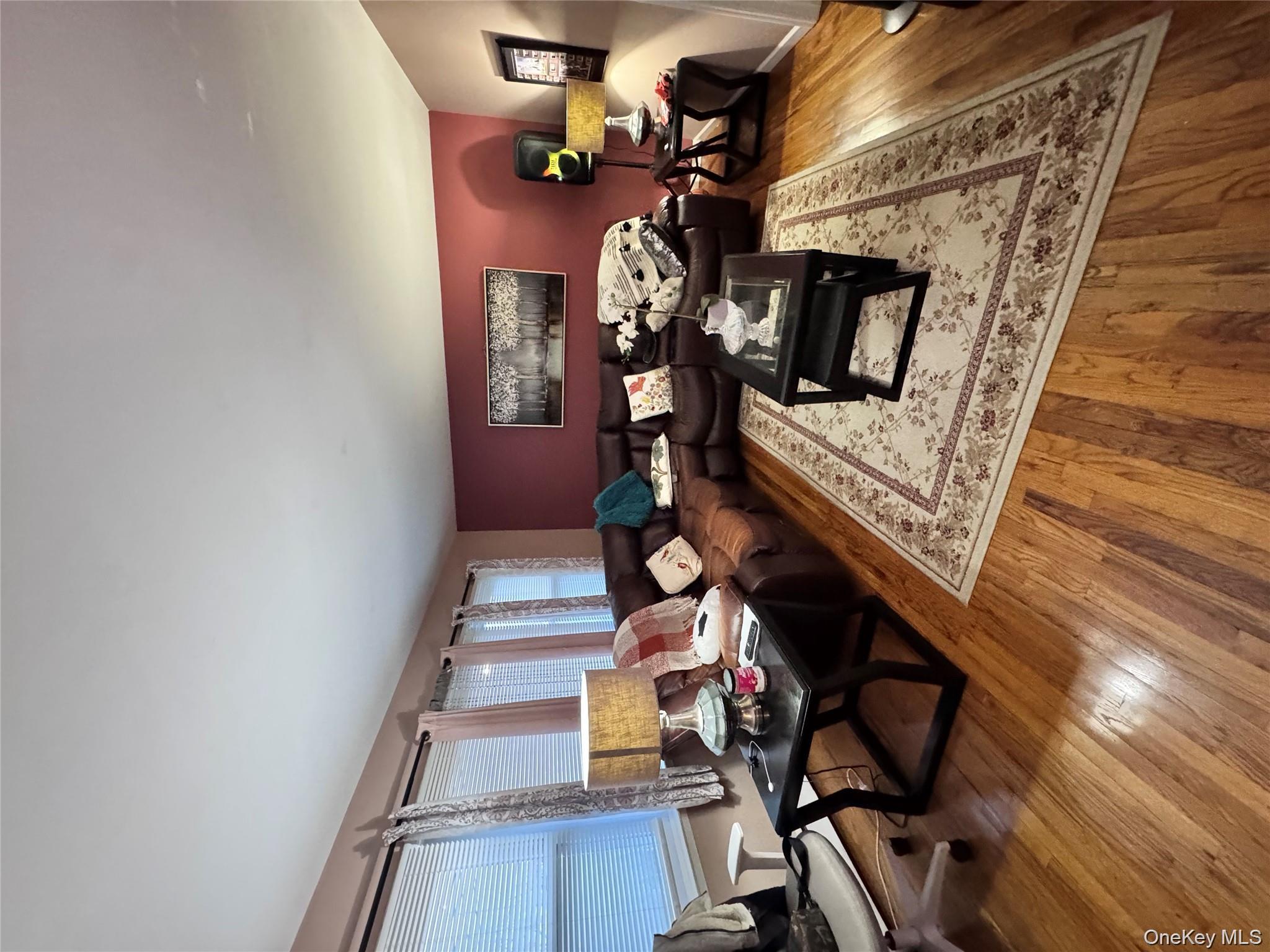 36 Monroe Place Hempstead, NY 11550 - Photo 5 of 5 Living area with hardwood / wood-style flooring