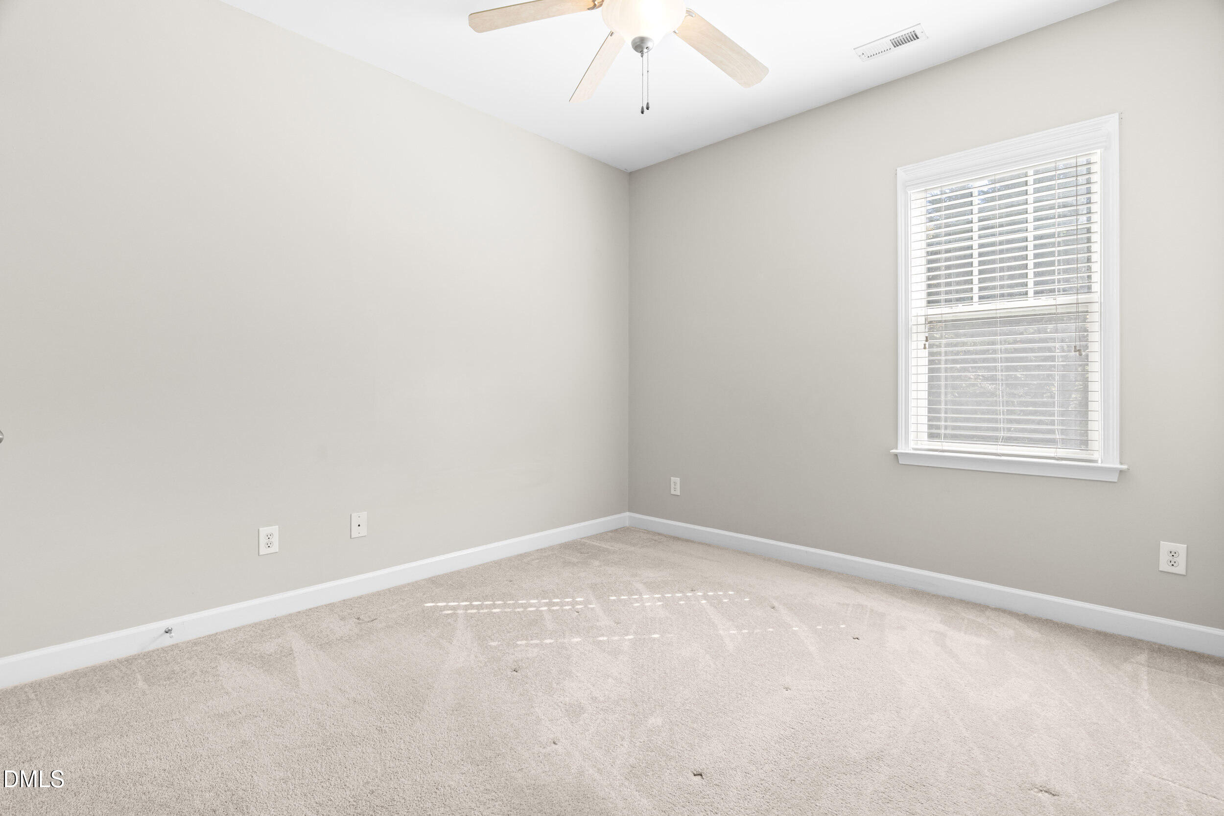 2522 Spring Oaks Way Raleigh, NC 27614 - Photo 22 of 30 an empty room with a window