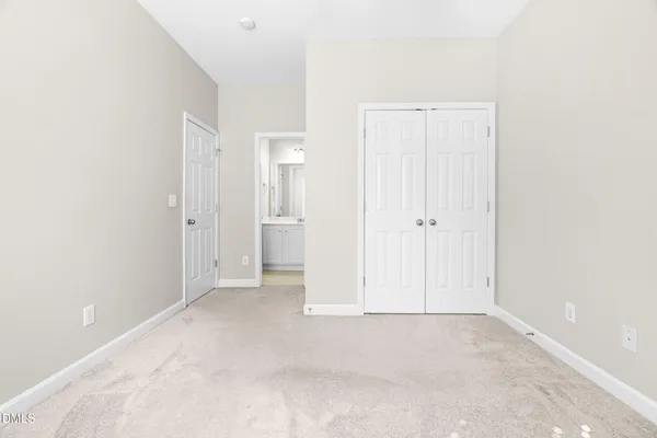 an empty room with an entryway