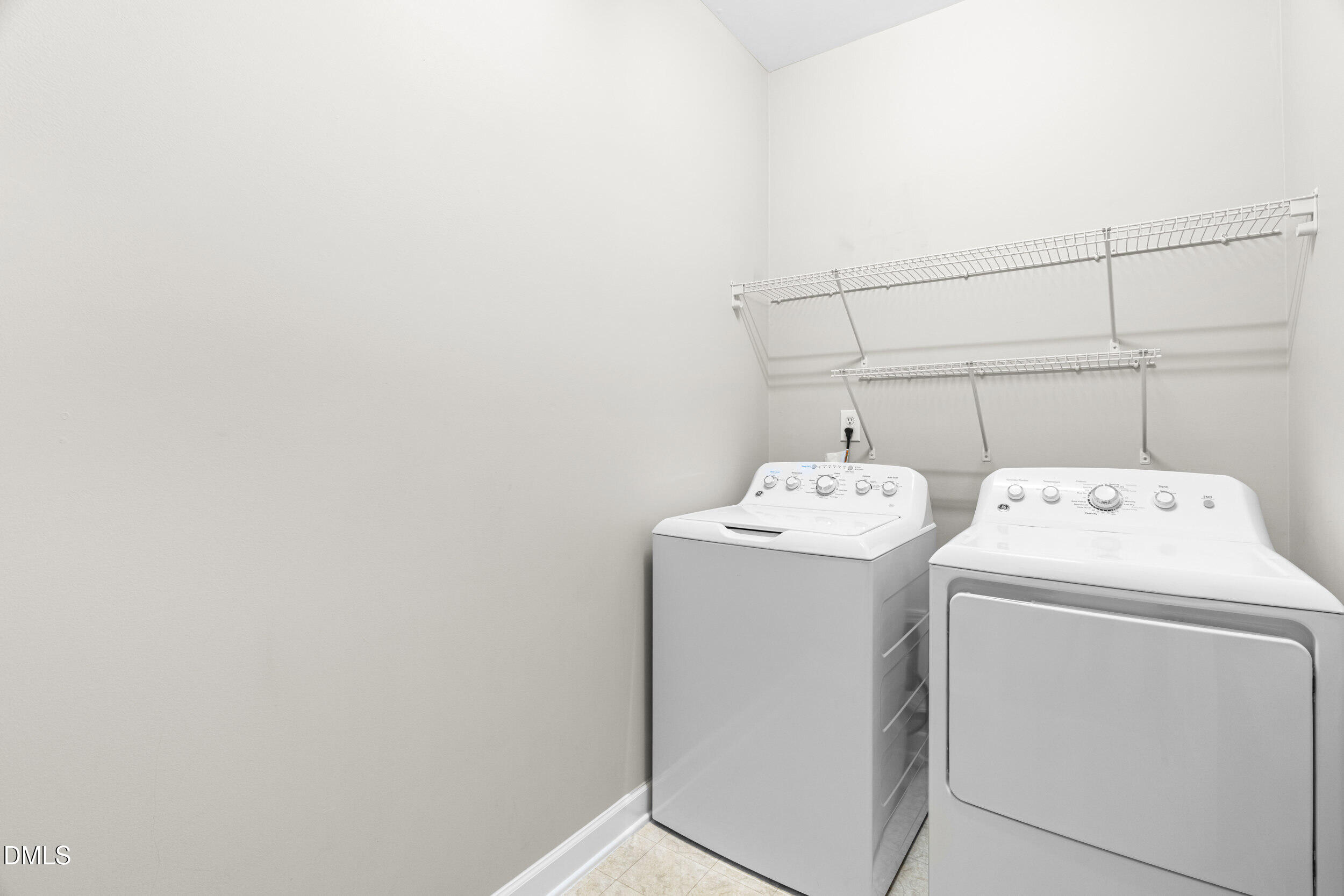 2522 Spring Oaks Way Raleigh, NC 27614 - Photo 25 of 30 a utility room with dryer and washer