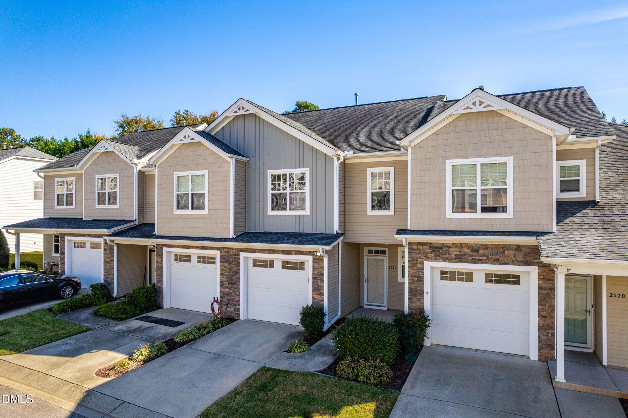 2522 Spring Oaks Way Raleigh, NC 27614 - Photo 3 of 30 a front view of a house with a garden and yard