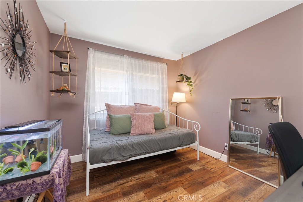 4384 Mill Valley Road Moorpark, CA 93021 - Photo 19 of 32 a bedroom with a bed and a window