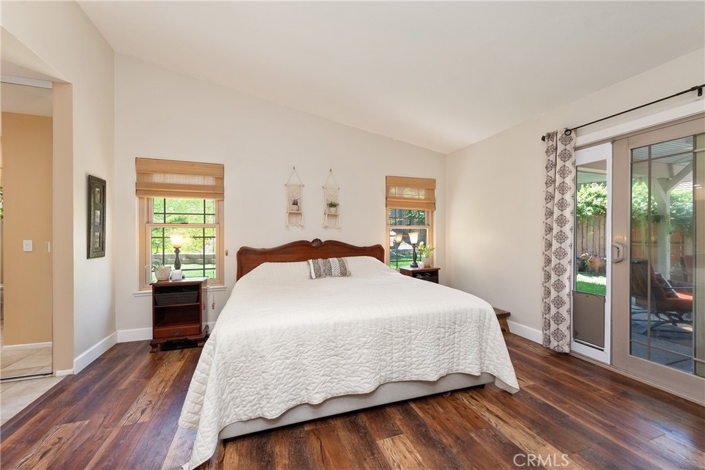 4384 Mill Valley Road Moorpark, CA 93021 - Photo 20 of 32 a bedroom with a bed and wooden floor