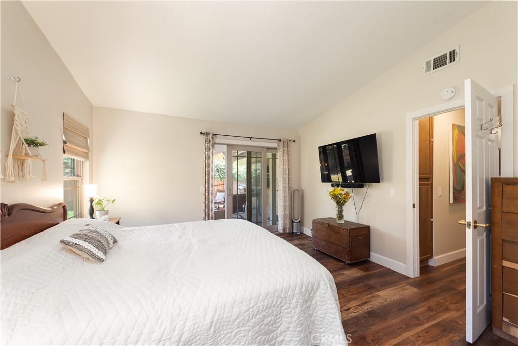 4384 Mill Valley Road Moorpark, CA 93021 - Photo 24 of 32 a bedroom with a bed and a flat screen tv