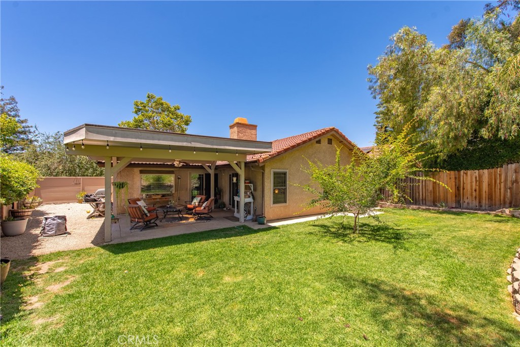 4384 Mill Valley Road Moorpark, CA 93021 - Photo 28 of 32 a view of a house with backyard and sitting area