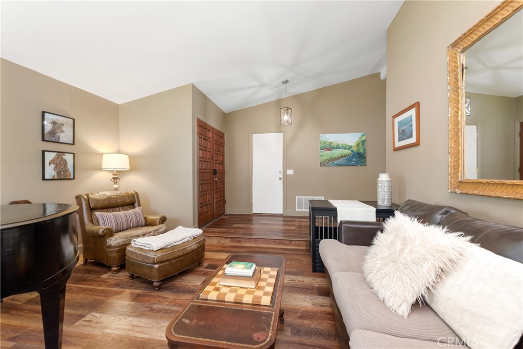4384 Mill Valley Road Moorpark, CA 93021 - Photo 6 of 32 a living room with furniture and wooden floor