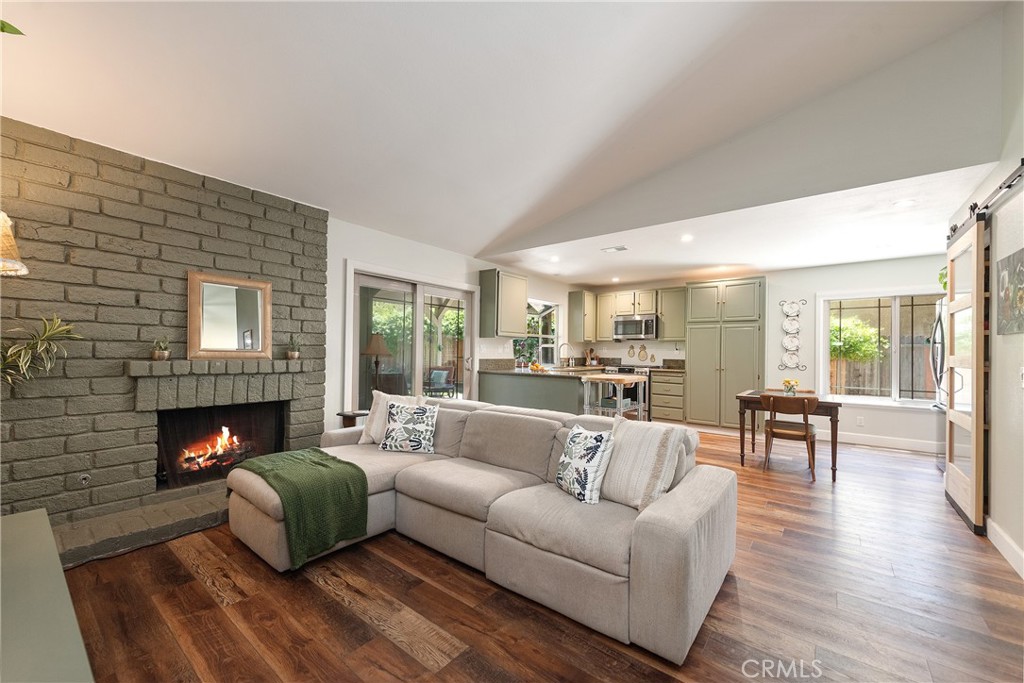 4384 Mill Valley Road Moorpark, CA 93021 - Photo 7 of 32 a living room with furniture and a fireplace