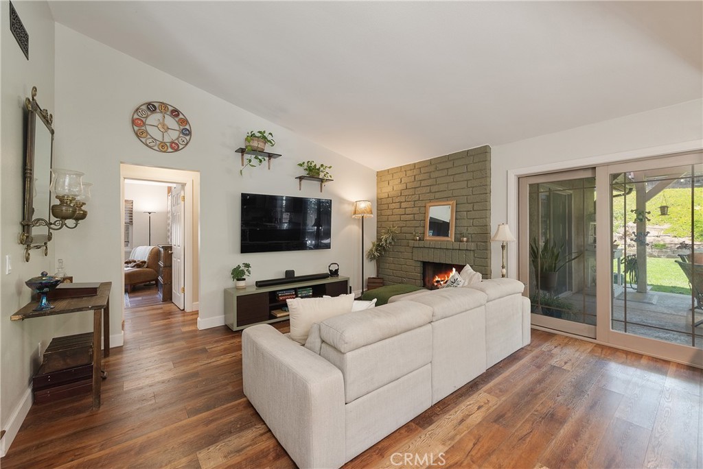 4384 Mill Valley Road Moorpark, CA 93021 - Photo 8 of 32 a living room with furniture and a flat screen tv
