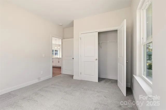 wooden floor and closet in a room