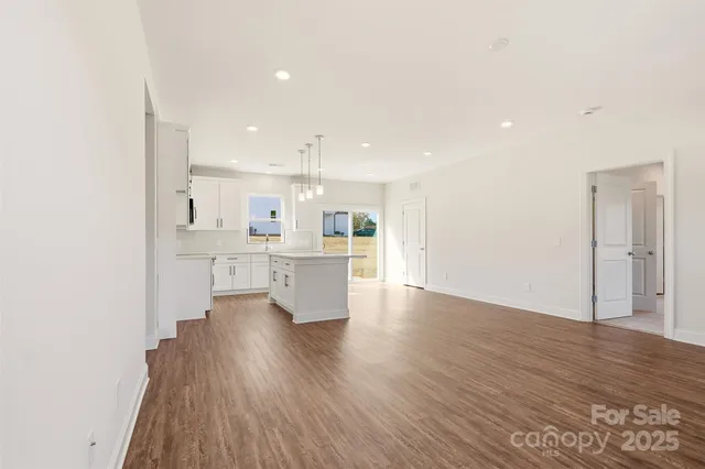 a view of kitchen with wooden floor