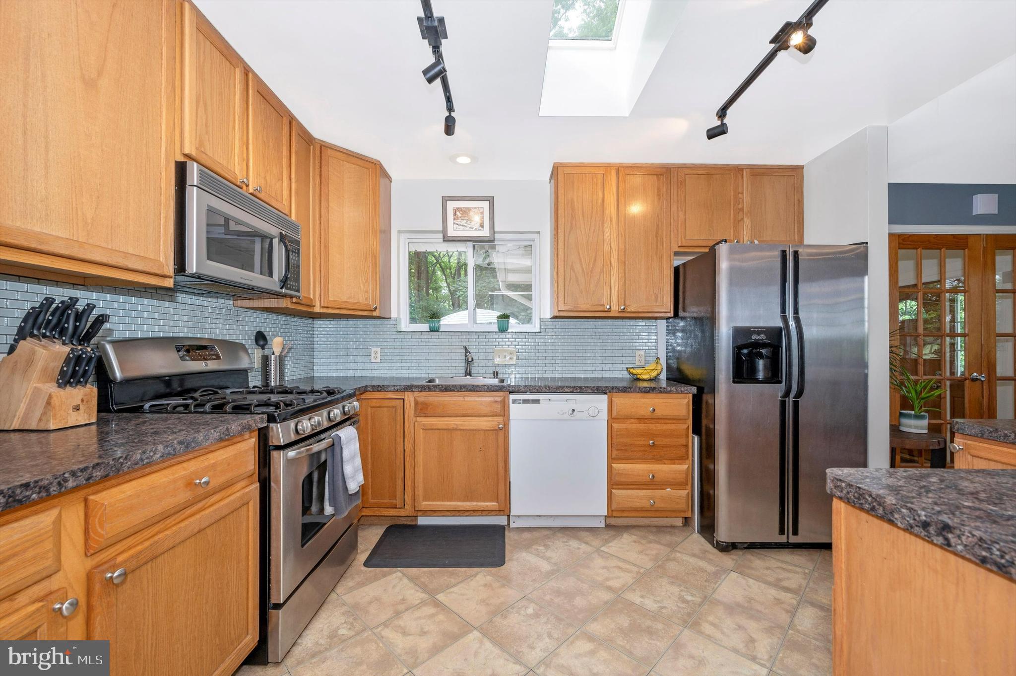 9521 Riggs Road Adelphi, MD 20783 - Photo 19 of 51 Fully Appointed Kitchen w/Skylight & Track Lights