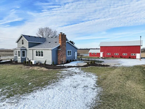 a view of a house with a garage
