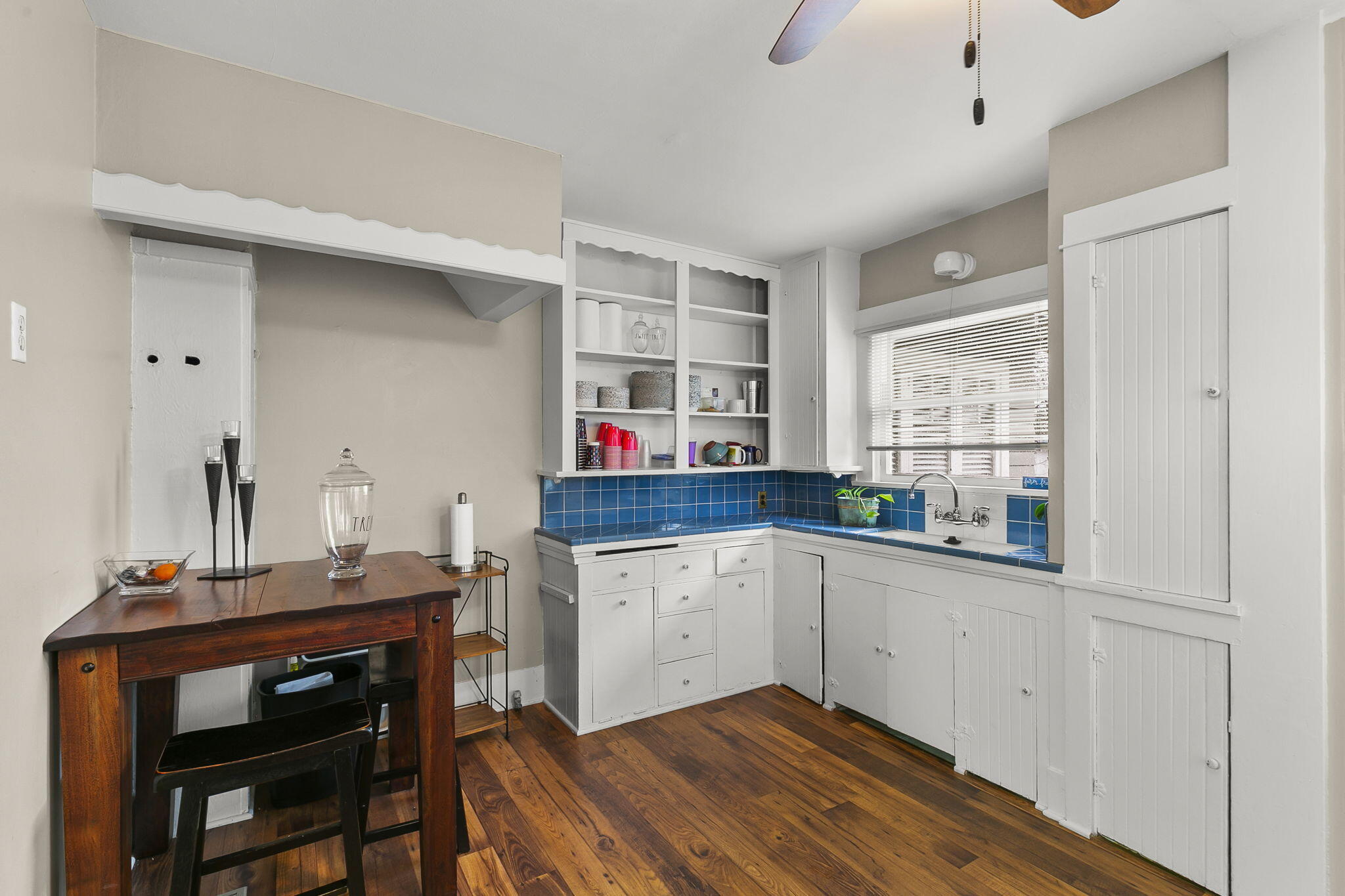 405 West Ojai Avenue Ojai, CA 93023 - Photo 13 of 21 a kitchen with a sink cabinets and window