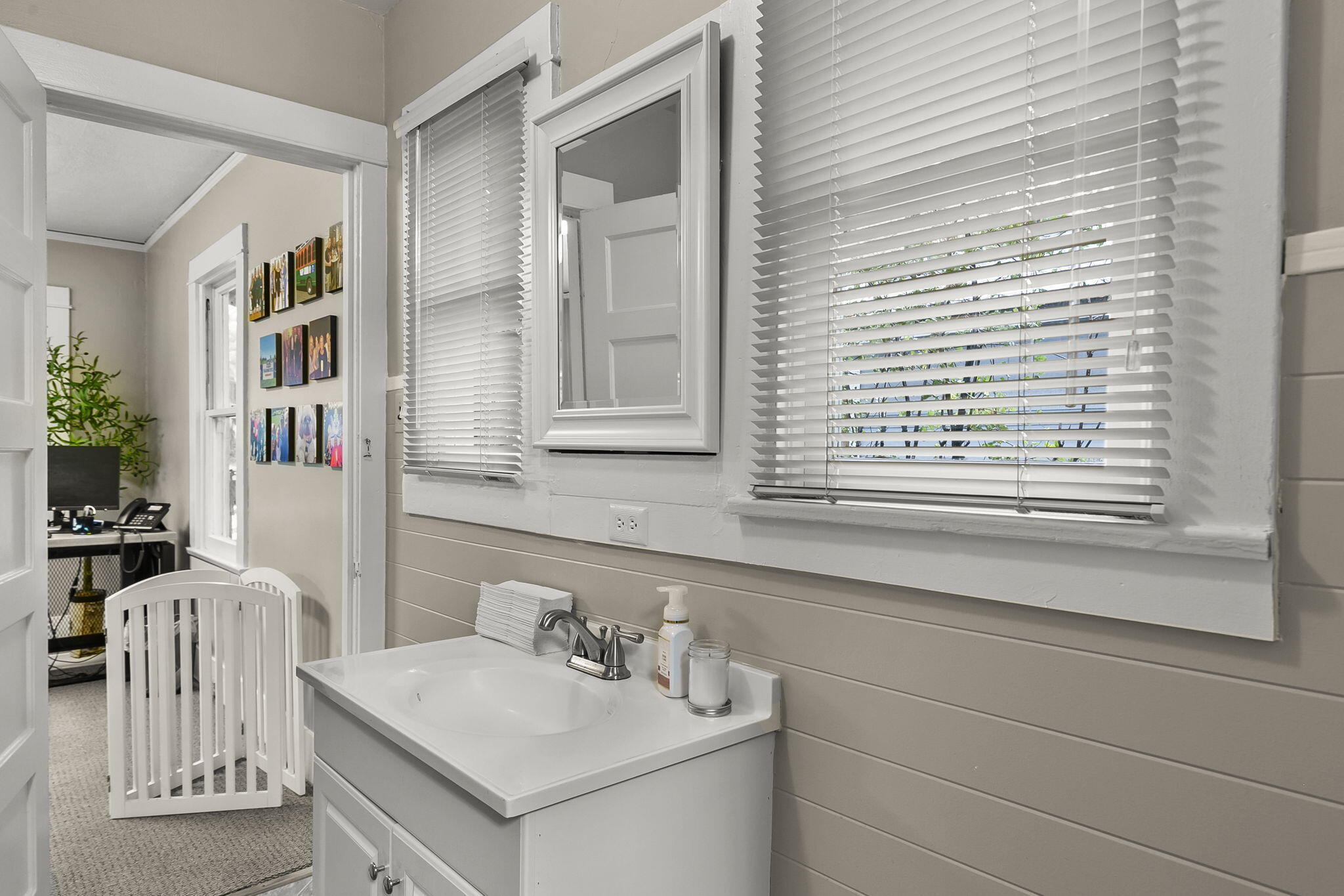 405 West Ojai Avenue Ojai, CA 93023 - Photo 10 of 21 a bathroom with a sink vanity and a mirror