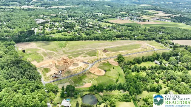 a view of a swimming pool with a yard