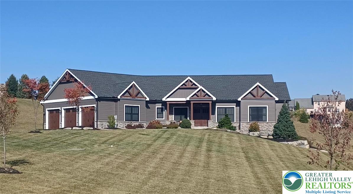 1225 Quince Road Walnutport, PA 18088 - Photo 2 of 50 front view of a house with a yard