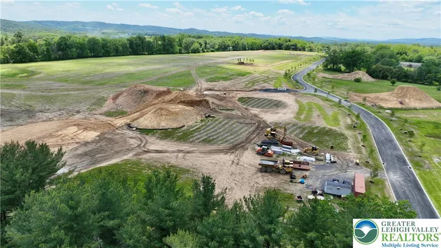 a view of a lake with a big yard