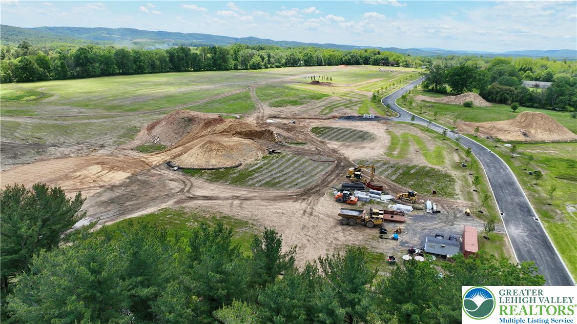 1225 Quince Road Walnutport, PA 18088 - Photo 31 of 50 a view of a street with a yard