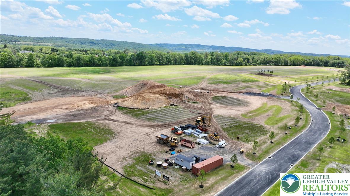 1225 Quince Road Walnutport, PA 18088 - Photo 38 of 50 a view of a lake with a mountain