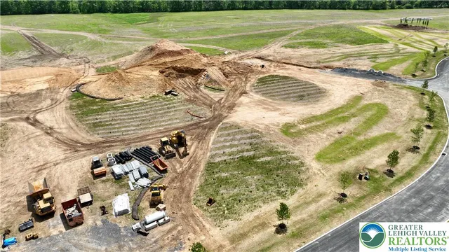 a view of a garden with a building