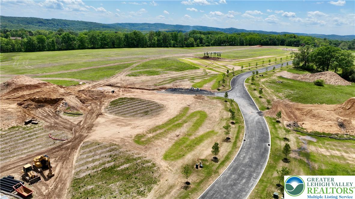 1225 Quince Road Walnutport, PA 18088 - Photo 40 of 50 a view of a swimming pool with a yard