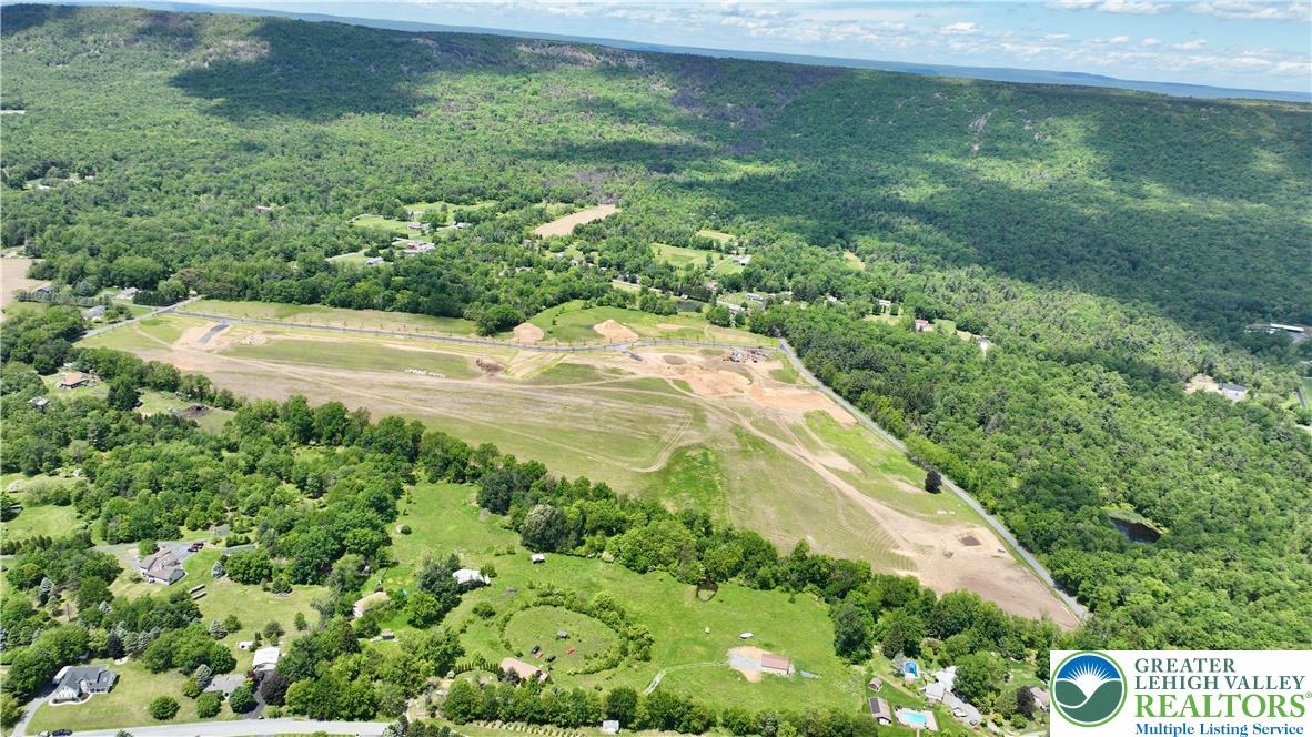 1225 Quince Road Walnutport, PA 18088 - Photo 41 of 50 a view of a garden with a building