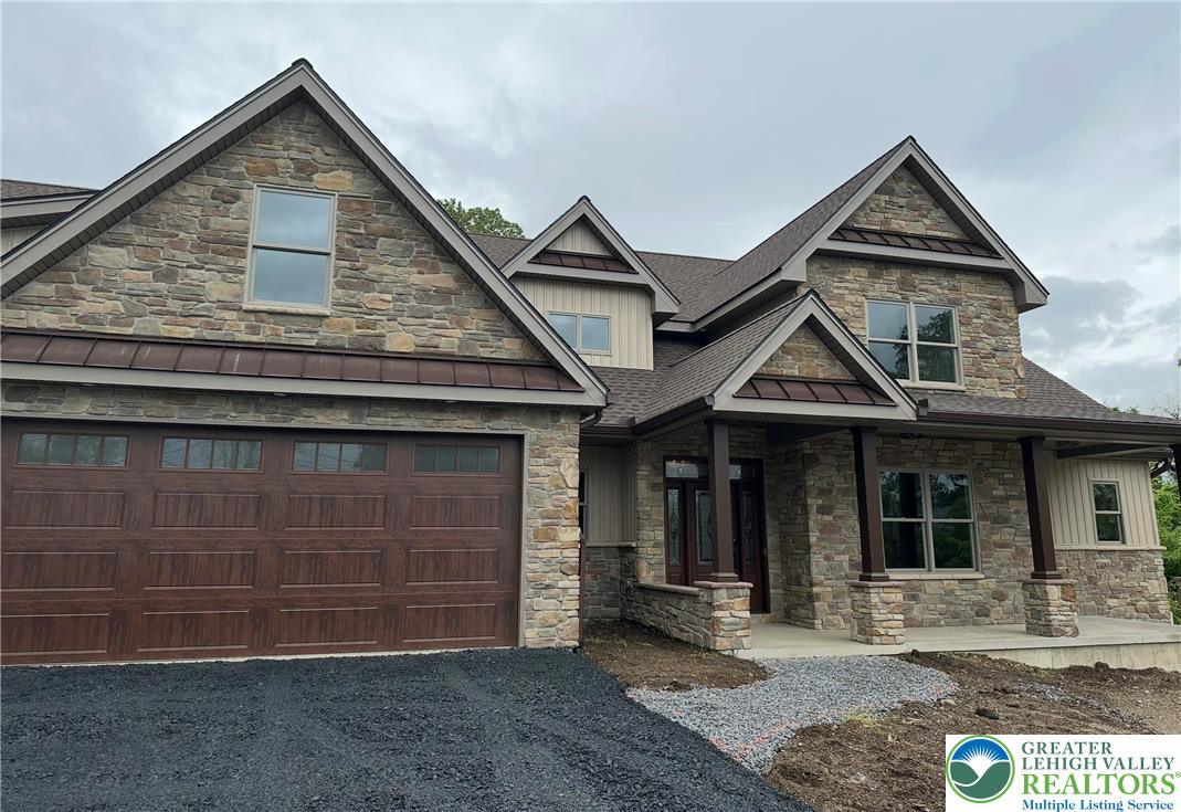 1225 Quince Road Walnutport, PA 18088 - Photo 10 of 50 a front view of a house with a yard