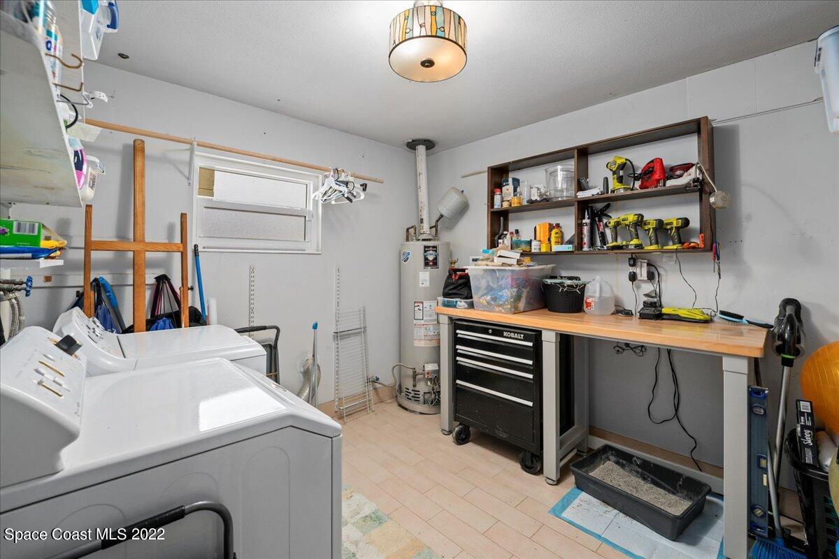 960 Kings Post Road Rockledge, FL 32955 - Photo 21 of 39 a room with storage and utility