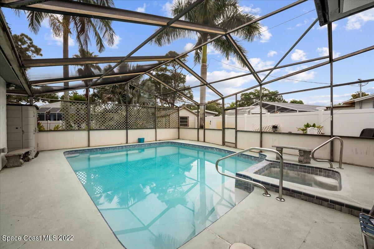 960 Kings Post Road Rockledge, FL 32955 - Photo 26 of 39 a view of a swimming pool with a patio