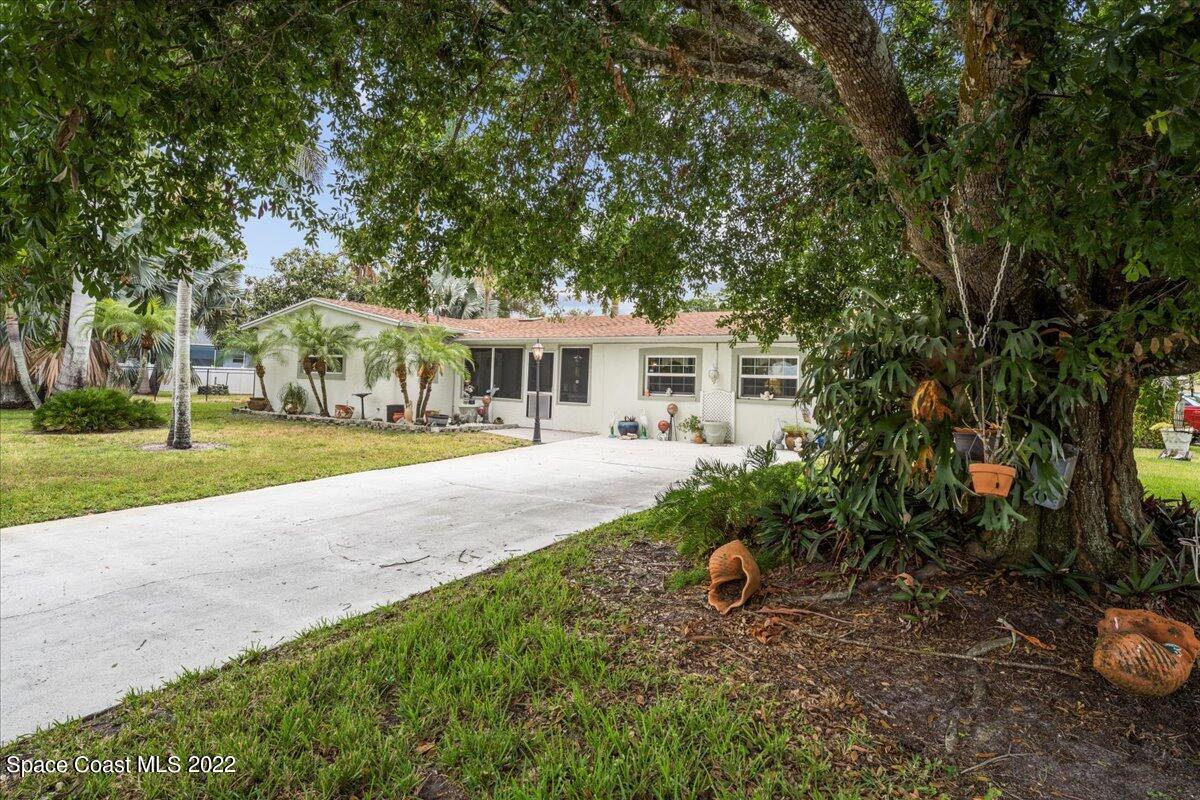 960 Kings Post Road Rockledge, FL 32955 - Photo 31 of 39 a house view with a garden space