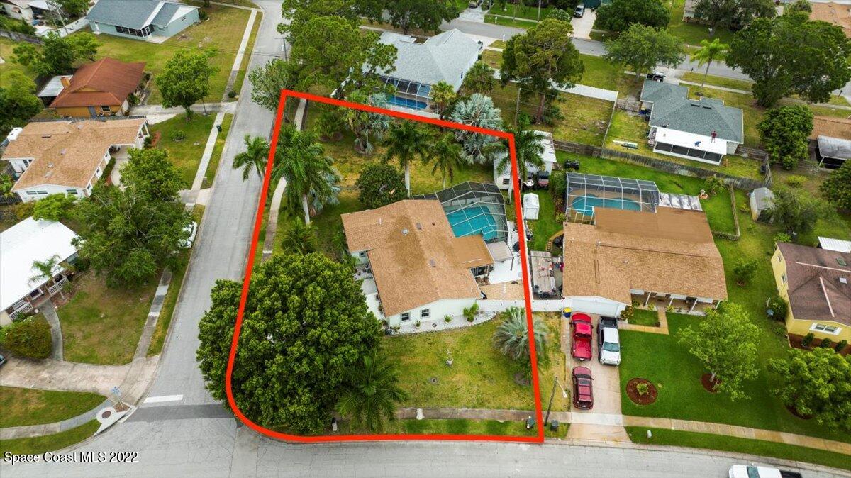 960 Kings Post Road Rockledge, FL 32955 - Photo 34 of 39 an aerial view of a house with outdoor space