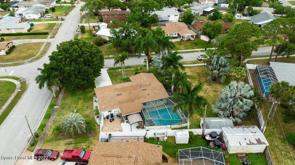 960 Kings Post Road Rockledge, FL 32955 - Photo 36 of 39 an aerial view of residential houses with outdoor space