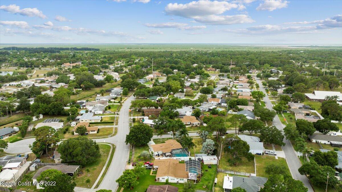 960 Kings Post Road Rockledge, FL 32955 - Photo 37 of 39 an aerial view of residential houses with outdoor space