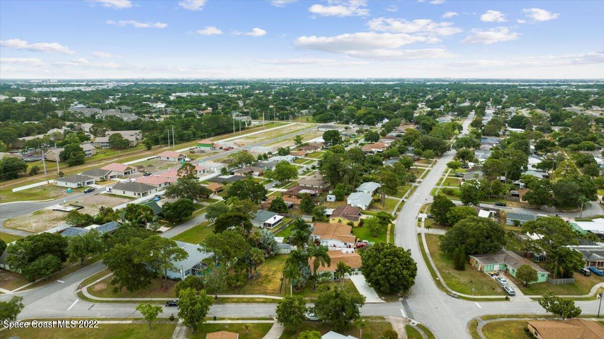 960 Kings Post Road Rockledge, FL 32955 - Photo 38 of 39 an aerial view of residential houses with outdoor space