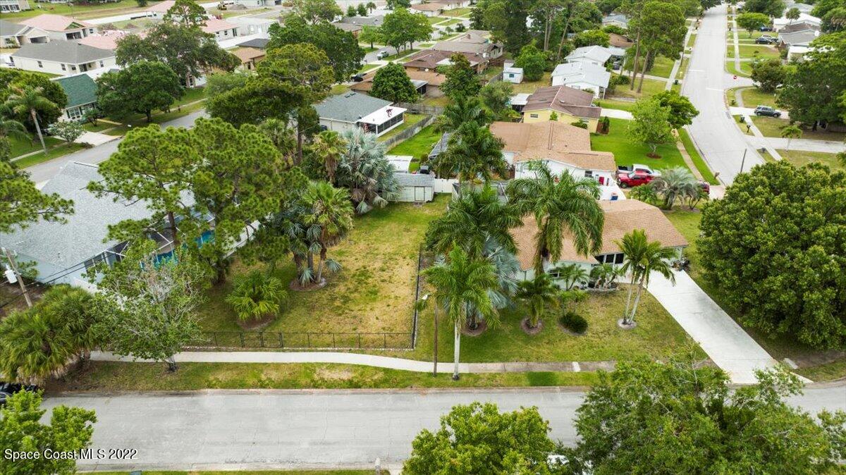 960 Kings Post Road Rockledge, FL 32955 - Photo 39 of 39 a view of swimming pool with a yard