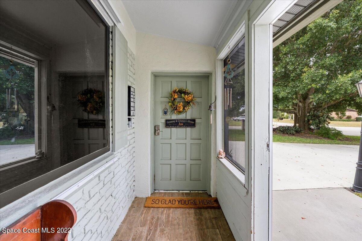 960 Kings Post Road Rockledge, FL 32955 - Photo 4 of 39 a view of a entryway door