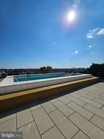 a view of swimming pool and city view