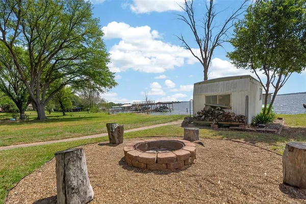 a view of a trees in front of a house