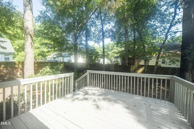a view of a wooden roof deck