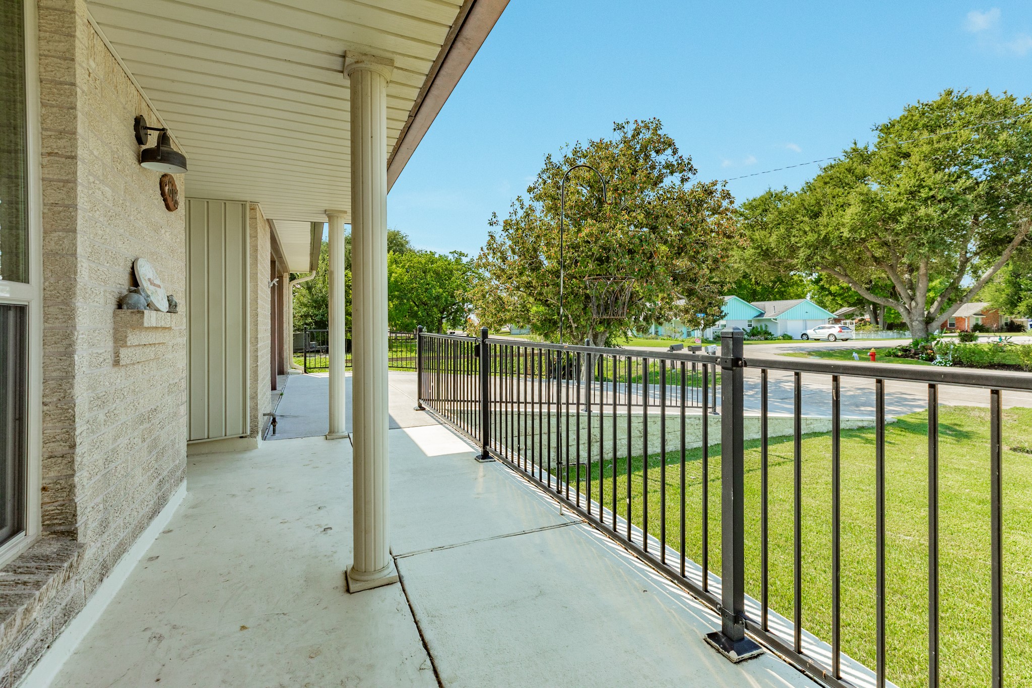 616 Bel Road Kemah, TX 77565 - Photo 22 of 23 The generous covered entry provides a welcoming approach to the home and features a decorative glass front door.