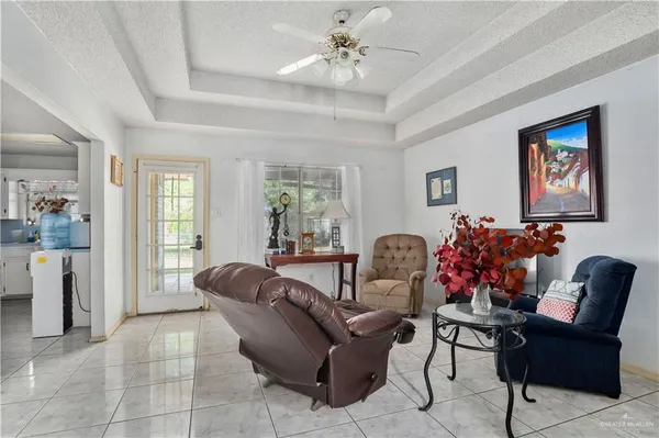 a living room with furniture and a window