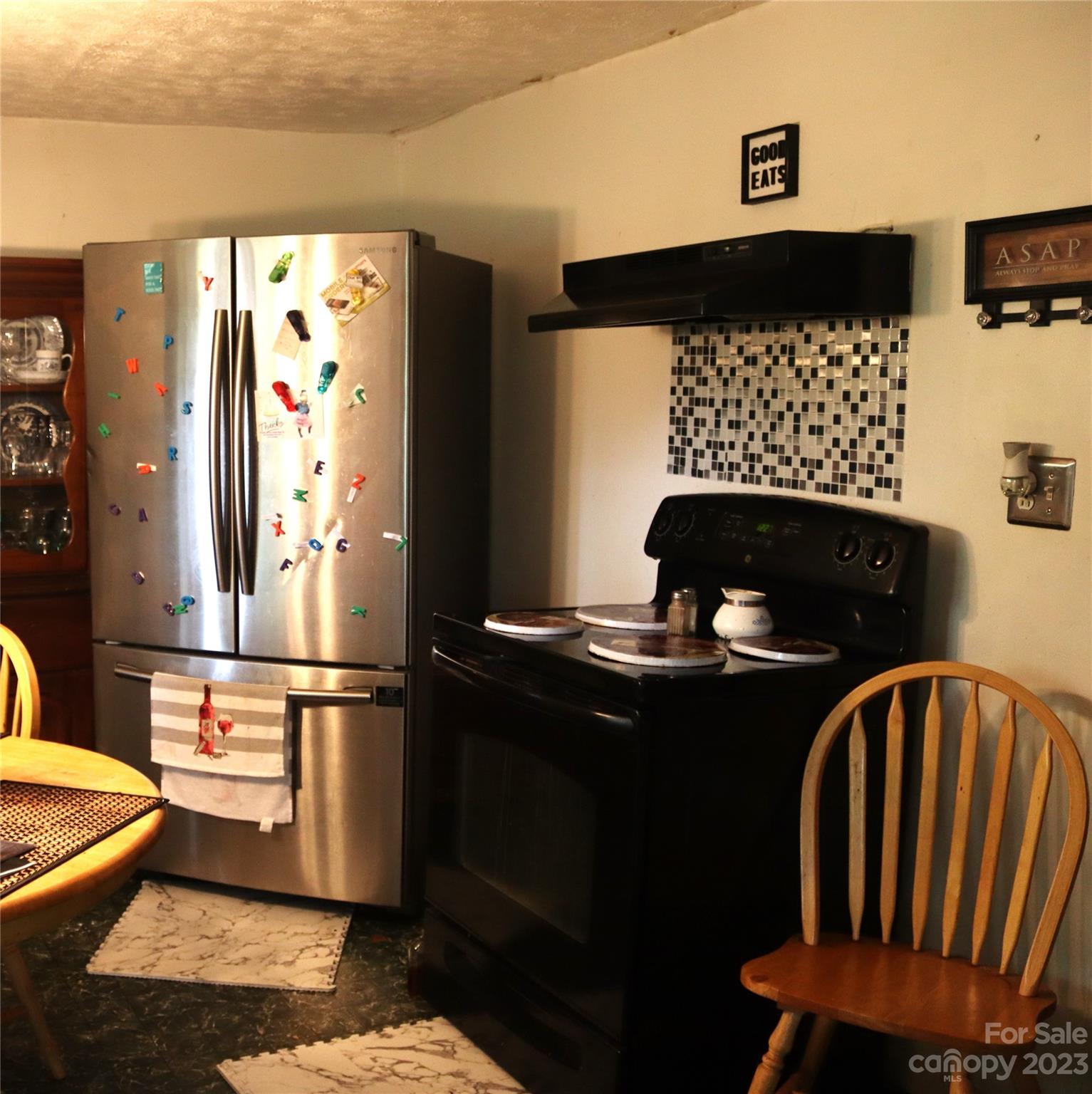 3105 Harmon Homestead Road Shelby, NC 28150 - Photo 4 of 8 a living room with furniture and a fireplace