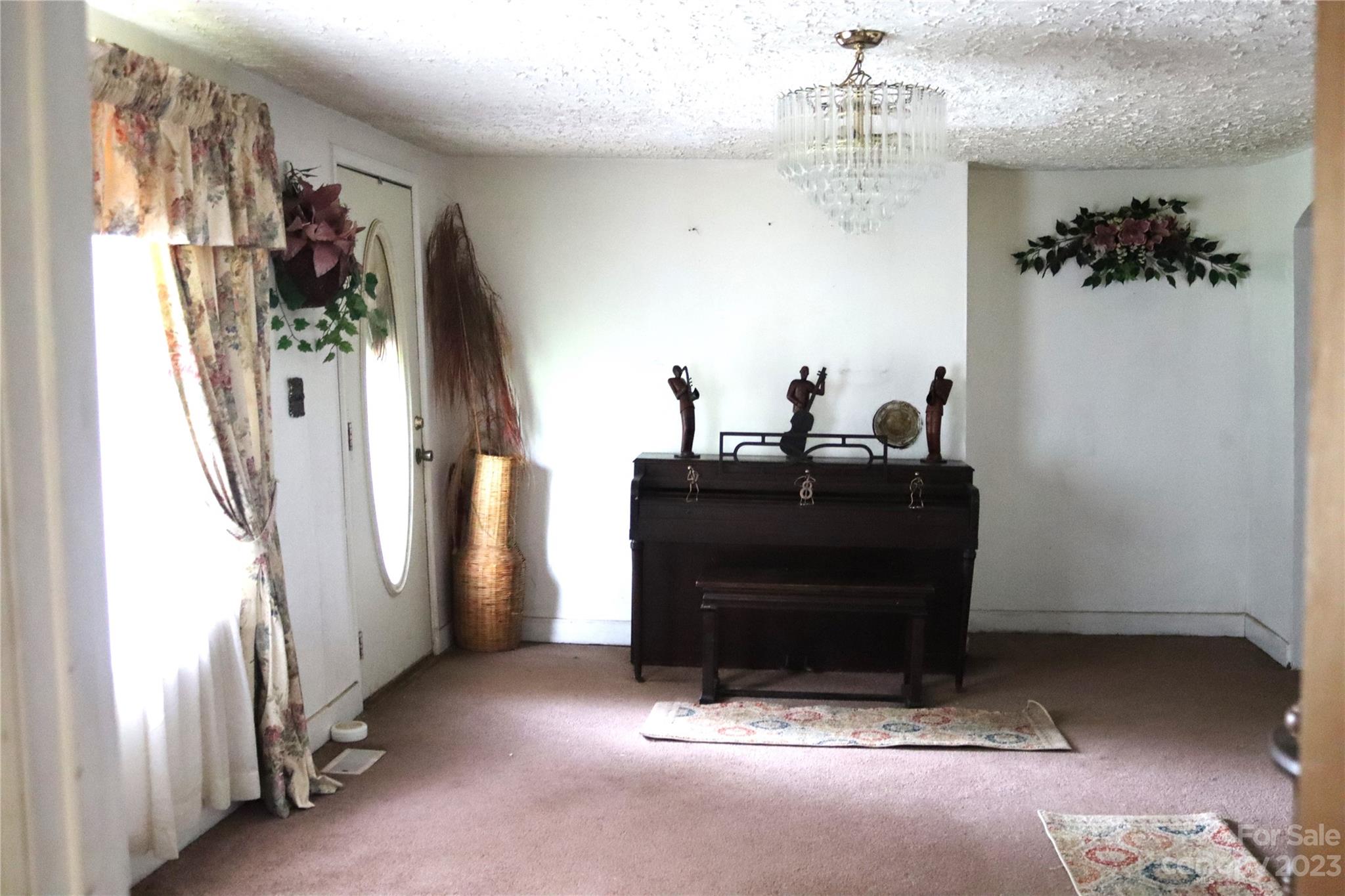 3105 Harmon Homestead Road Shelby, NC 28150 - Photo 5 of 8 a view of a hallway with workspace