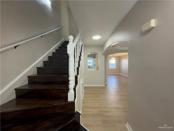 a view of livingroom and hardwood floor